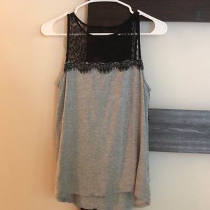 Cute Tank Top with back cutout and feathered top